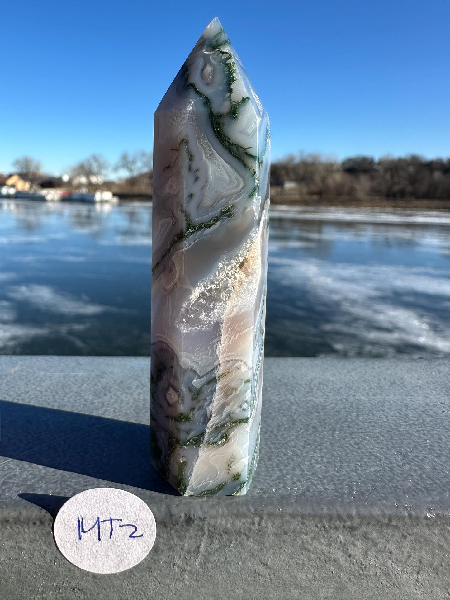 Beautiful Moss Agate Tower Carving with Quartz and a Druzy Pocket