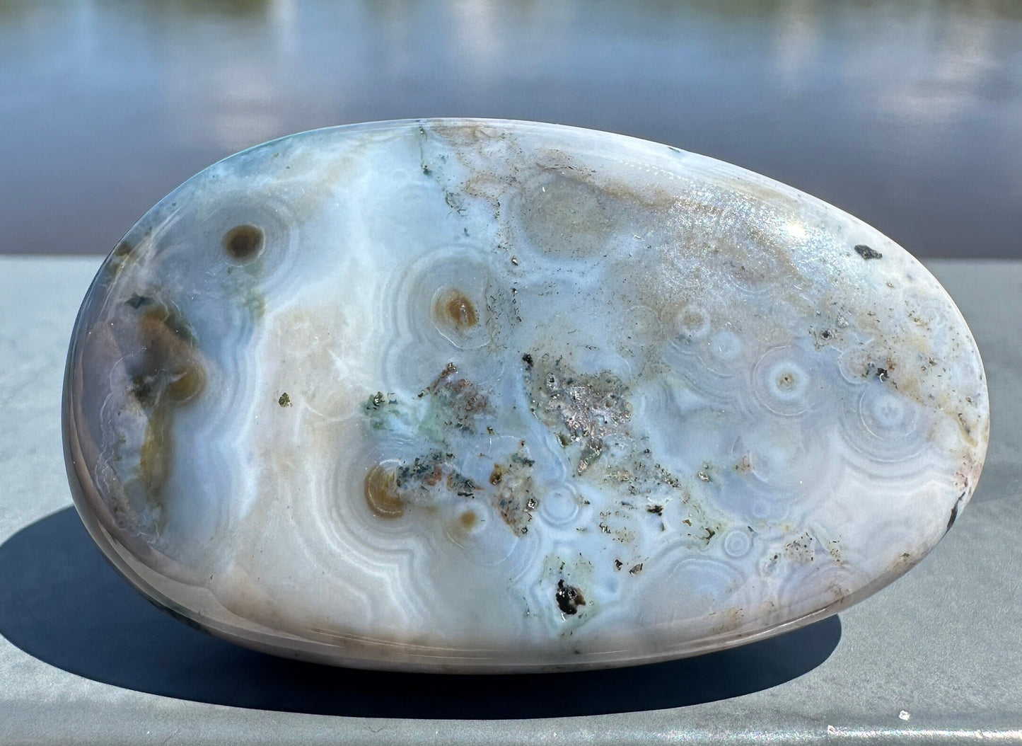 High Quality Orbicular Ocean Jasper Palm Stone